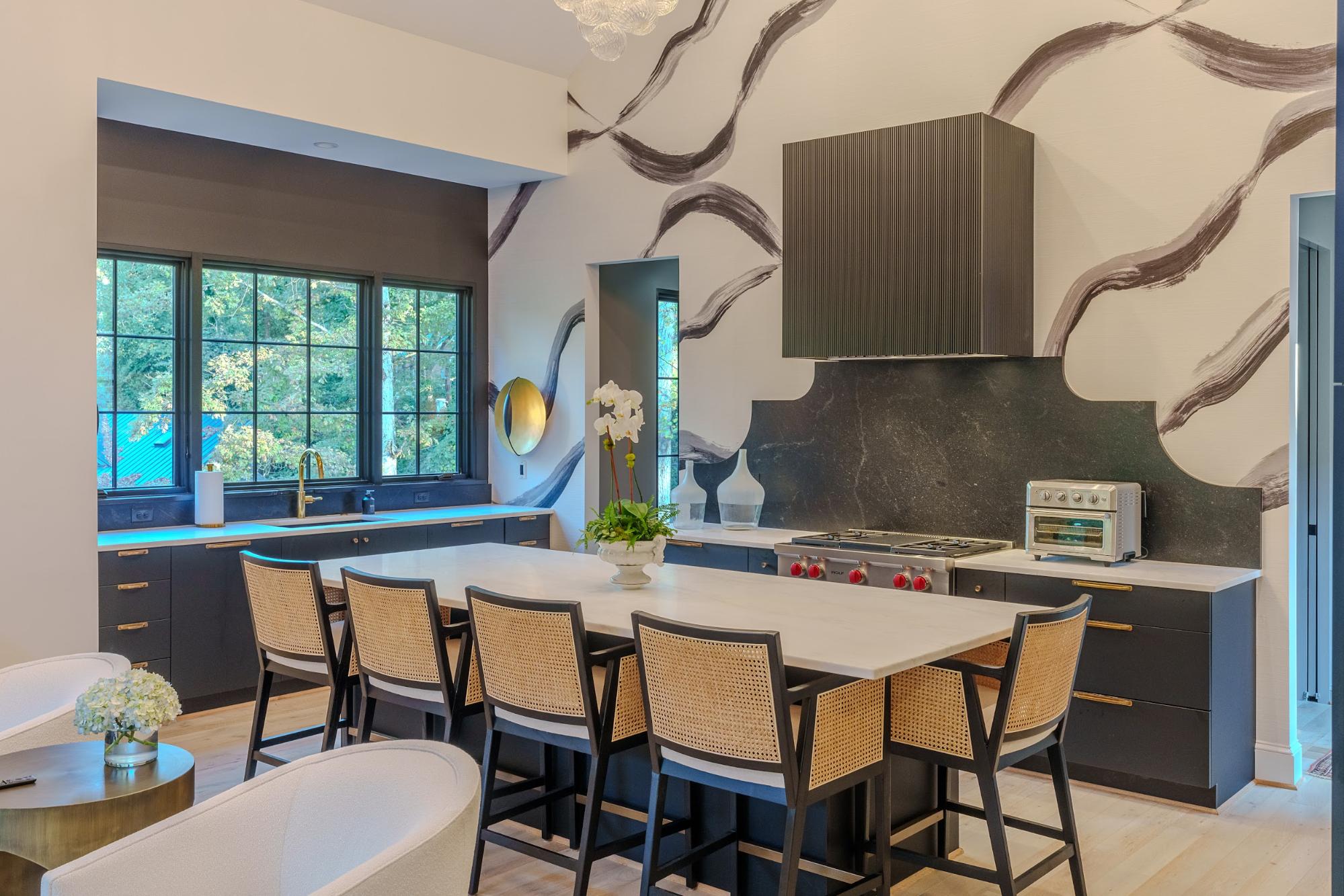 Contemporary kitchen design featuring black accents and a spacious layout